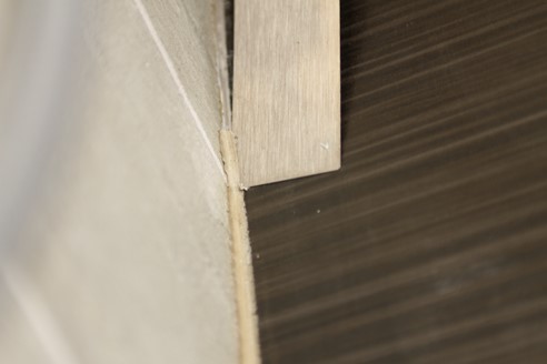 remove loose caulk