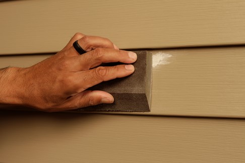 At Home: Adhesive tape fixes holes in vinyl siding